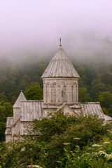 Vertical shot of an ancient Haghartsin monastery, located near the town of Dilijan in Armenia