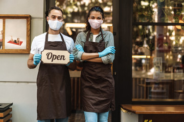 Man and woman coffee shop owners