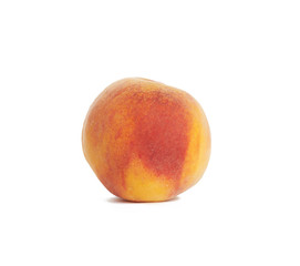 whole ripe red peach isolated on a white background