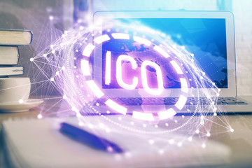 Multi exposure of blockchain theme hologram and table with computer background. Concept of bitcoin crypto currency.