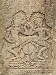 Fototapeta na wymiar Davatas and Lotus Flower, Angkor Wat