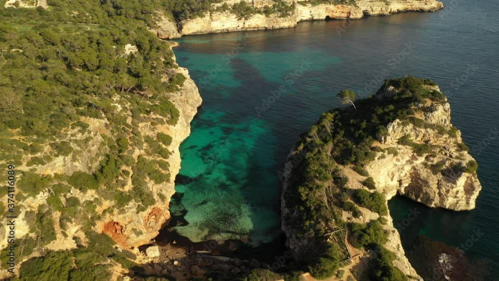 Canvas Prints flying a drone over the bay of caló del moro mallorca spain