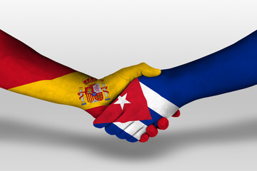 Handshake between cuba and spain flags painted on hands, illustration with clipping path.