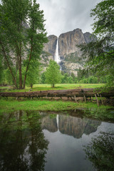 reflection of yosemite falls in merced river, yosemite national park, usa