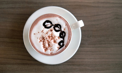 Morning hot cocoa and milk foam