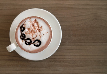 Morning hot cocoa and milk foam