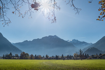 Beautiful view landscape include mountain field by tree against sky in Interlaken Switzerland
