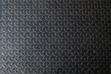 Metal floor plate with diamond steel pattern, metal sheet texture background.