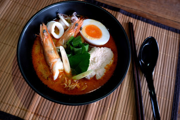 Tom yum kung (Thai cuisine),Tom Yum Kung seafood soup with noodles. Tom yam is a spicy clear soup typical in Thailand