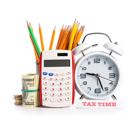 Alarm clock with calculator and money on white background. Concept of tax deadline
