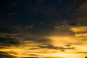 Naklejka na ściany i meble landscape of sunlight and cloud on the sky in sunset