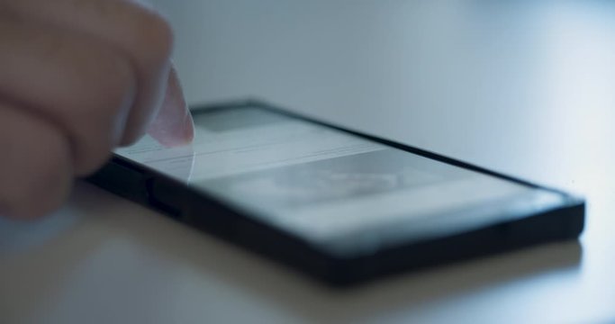 Scrolling on Phone. Person casually scrolls through their social media feed on their mobile device.