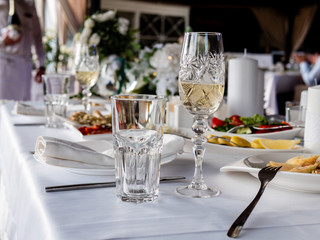 Empty glasses set in restaurant. Part of interior