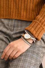 Woman with stylish wrist watch, closeup