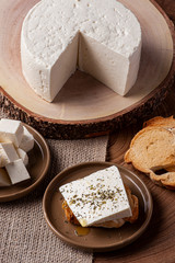 .Fresh round cheese, typical of the interior of Brazil in the state of Minas Gerais - Minas frescal.