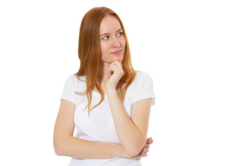 Portrait of a smiling thinking woman looking away - isolated on white