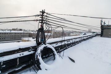 Rooftop of industrial building covered with snow in Saint Petersburg