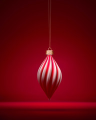Red and white matt twisted oblong Christmas ball