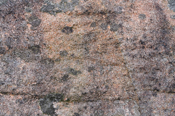 Close up of a piece of multi coloured Derbyshire sandstone