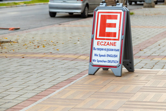 Alanya, Turkey - 23 Aug 2020: Eczane sign with multi lingual transletion of word meaning. Sign stating Pharmacy for tourists speaking different languages.