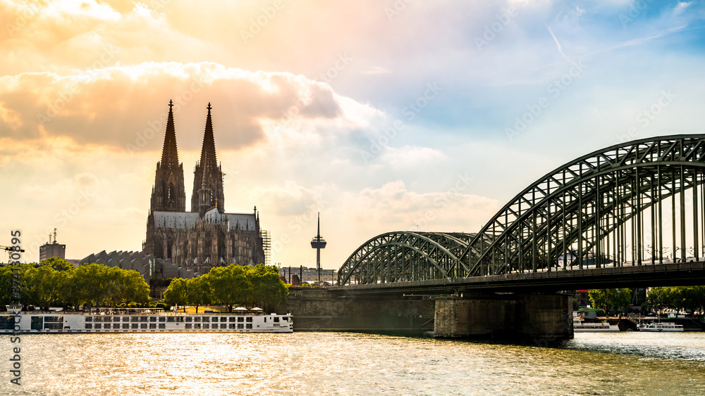 Wall mural cologne cathedral, the rhine and the hohenzollern bridge