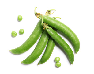Tasty fresh peas on white background