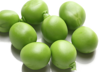 Tasty fresh peas on white background