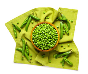 Bowl with tasty fresh peas on white background