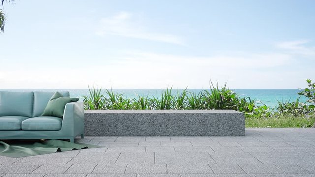 Sofa on outdoor terrace near garden in modern beach house or luxury villa. Cozy home patio 3d rendering with sea view.