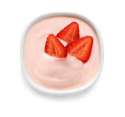 Bowl of strawberry yogurt on white background