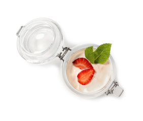 Jar of strawberry yogurt on white background