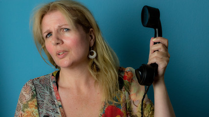 woman receiving abusive phone call 