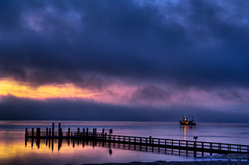 Obraz premium Lichtstimmung und sich lichtender Nebel an der Nordseeküste