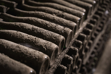 aged wine bottles covered with mold in vintage wine cellar
