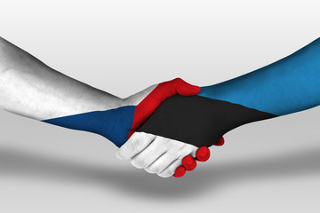 Handshake between estonia and czech republic flags painted on hands, illustration with clipping...