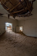 Decaying architecture at Kolmanskop, an abandoned diamond mining town