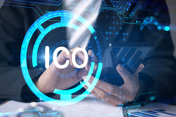 Businesswoman using smart phone in office. ICO hologram. Initial coin offering concept. Double...