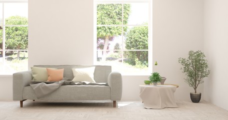 White living room with sofa and summer landscape in window. Scandinavian interior design. 3D illustration