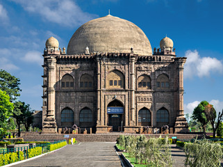 Entrance of Gol Gumbaz tomb of Adil Shah in Bijapur, Karnataka with nice clouds. © lalam