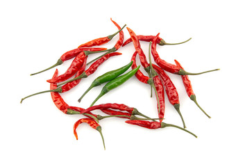 Dried red chilli and fresh green chilli on white background