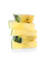 Cut yellow watermelon on white background