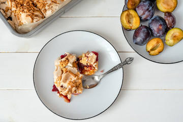 Plum cake. Homemade shortcrust pastry with purple plums.