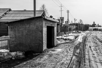 Fototapeta na wymiar old soviet bus stop in winter village