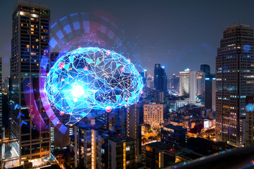 Human brain hologram, aerial panoramic city view of Bangkok at night. Educational cluster in Asia. The concept of artificial intelligence. Double exposure.