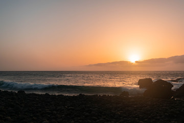 sunset in hidden stone beach in Gran Canaria