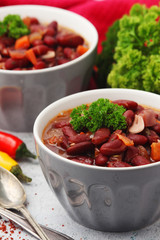 Two bowls with traditional Georgian dish - lobio