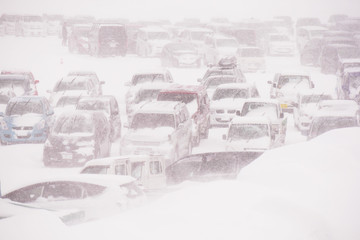 FEB 17, 2018 : IWATE, JAPAN : Cars parking under heavy snow storm