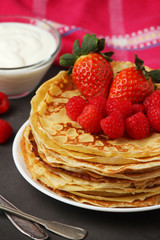 Russian cuisine national dish bliny with fresh berries	