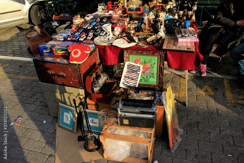 Wall mural stalls with vintage second hand items at the flea market of monastiraki in athens, greece, december 