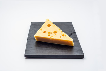 piece of cheese on a plate
